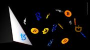 Symbolbild Kryptowährungen mit verschiedenen Währungsymbolen